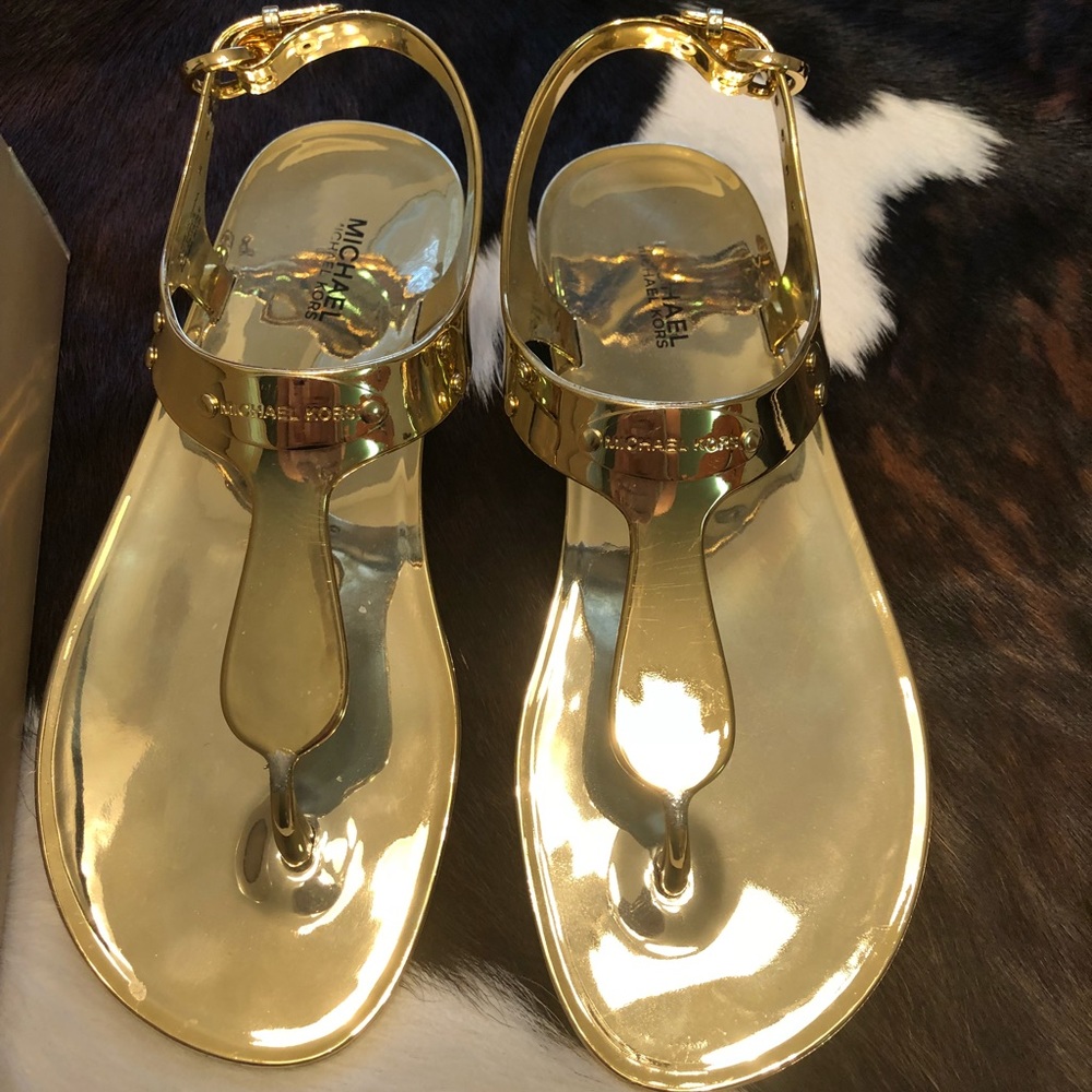 Gold Michael Kors jelly sandals